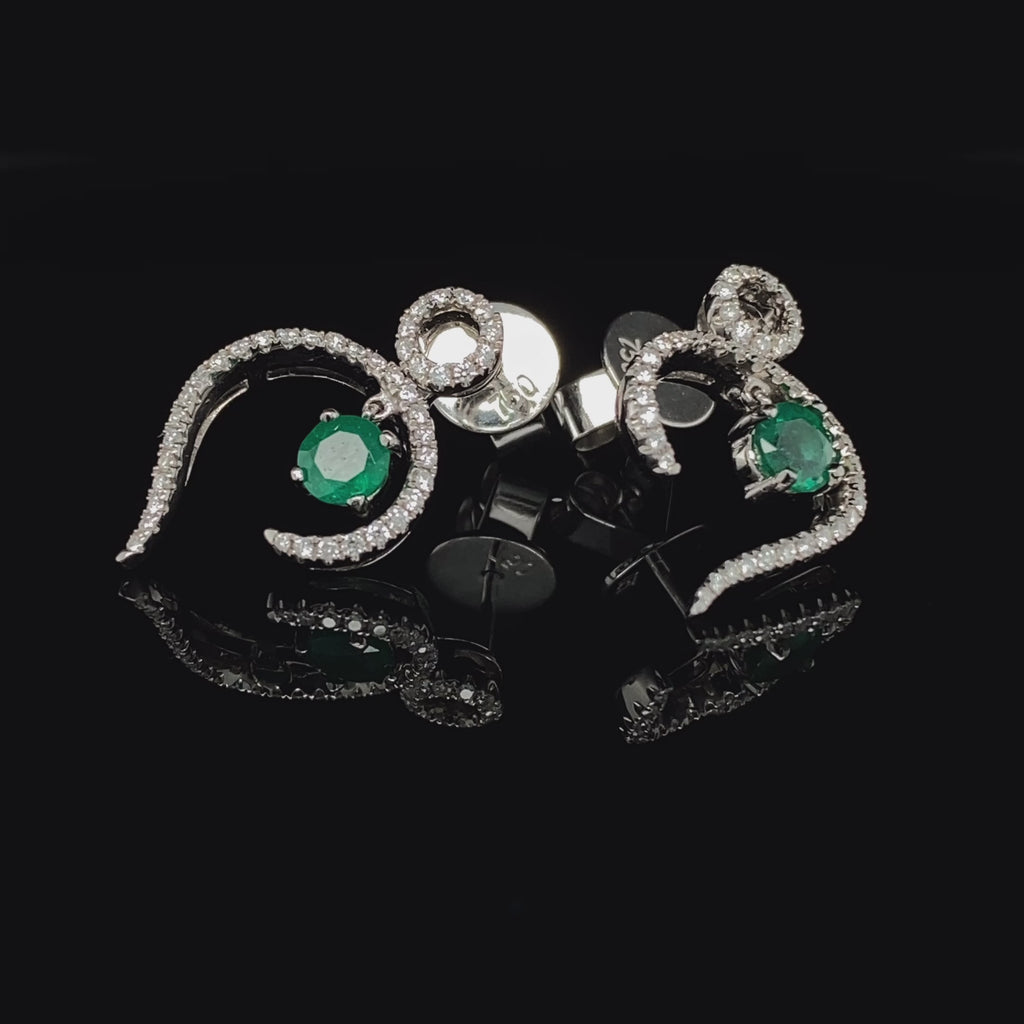 Video of 18k White Gold Emerald Diamond Statement Earrings. Available on DESIGNYARD.com and in our Jewellery Shop Dublin, Ireland. Free Worldwide Shipping with DHL.
