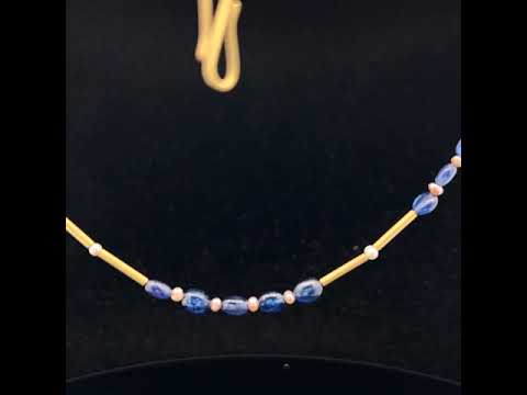 Video of Catherine Mannheim's Contemporary 18k Yellow Gold Sapphire Pearl Bar Necklace. Available on DESIGNYARD.com and in our Jewellery Shop Dublin, Ireland. Free Worldwide Shipping with DHL.