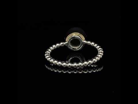 Video of Friederike Grace's Contemporary Silver Yellow Gold Caim Peridot Ring. Available on DESIGNYARD.com and in our Jewelry Store Dublin, Ireland.