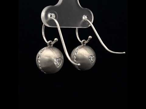 Video of Sam Lafford's Platinum An Grá Diamond Earrings. Available on DESIGNYARD.com and in our Contemporary Jewellery Shop Dublin, Ireland. Free Worldwide Shipping with DHL.