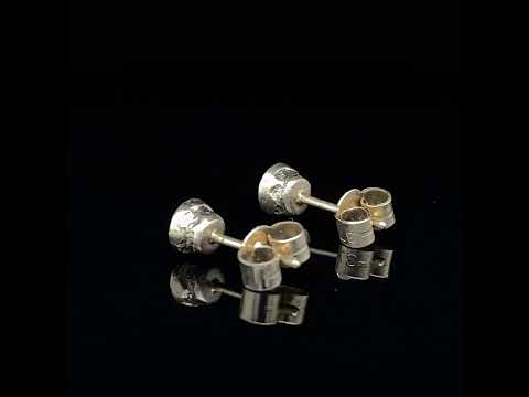 Video of Diana Porter's 9k Fair Trade White Gold Etched Teal Tourmaline Earrings. Available on DESIGNYARD.com and in our Contemporary Jewellery Shop Dublin, Ireland. Free Worldwide Shipping with DHL.
