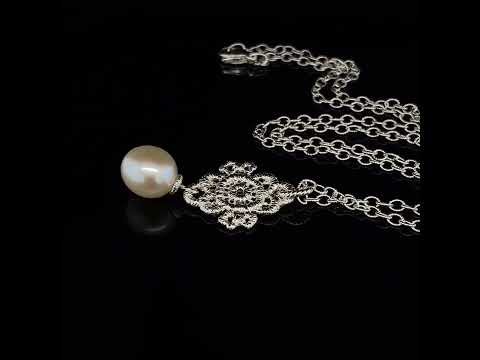 Video of Brigitte Adolph's Sterling Silver Mona Lisa Pearl Handmade Unique Pendant. Available on DESIGNYARD.com No 1 for Contemporary Jewellery Dublin, Ireland. Free Worldwide Shipping with DHL.