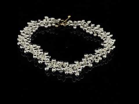 Video of Neeltje Huddleston Slater's Contemporary Fine Silver 14k Yellow Gold Double Beaded Bracelet. Available on DESIGNYARD.com and in our Jewellery Shop Dublin, Ireland. Free Worldwide Shipping with DHL.