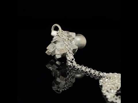 Video of Vanessa Ree's Contemporary Sterling Silver Adversity Cluster Pendant. Available on DESIGNYARD.com and in our Jewellery Shop Dublin, Ireland. Free Worldwide Shipping with DHL.