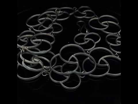 Video of Sophia Epp's Contemporary Silver Oxidised Three Pass Statement Necklace. Available on DESIGNYARD.com and in our Jewellery Shop Dublin, Ireland. Free Worldwide Shipping with DHL.