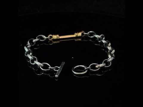 Video of Síne Vasquez's Silver Oxidised 14k Yellow Gold Diamond Pillar Bracelet. Available on DESIGNYARD.com and in our Contemporary Jewellery Shop Dublin, Ireland. Free Worldwide Shipping with DHL.