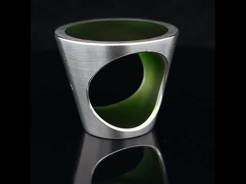 Video of Monika Jakubec's Contemporary Sterling Silver Green Resin Cone Ring. Available on DESIGNYARD.com and in our Jewellery Shop Dublin, Ireland. Free Worldwide Shipping with DHL.