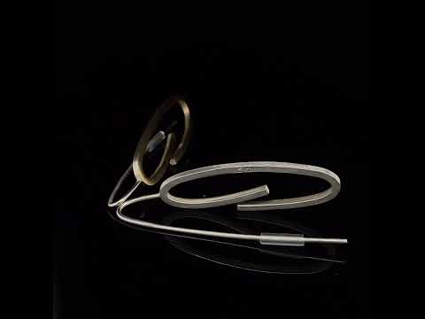 Video of Manu's Contemporary Silver 22k Yellow Gold Bi-Metal Swirl Earrings. Available on DESIGNYARD.com and in our Jewellery Shop Dublin, Ireland. Free Worldwide Shipping with DHL.