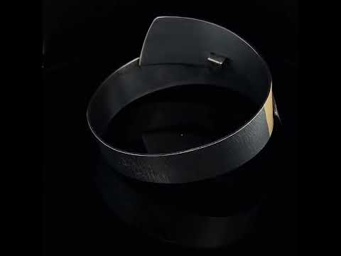 Video of Manu's Contemporary Silver Oxidised 22k Yellow Gold Bi-Metal Statement Bangle. Available on DESIGNYARD.com and in our Jewellery Shop Dublin, Ireland. Free Worldwide Shipping with DHL.