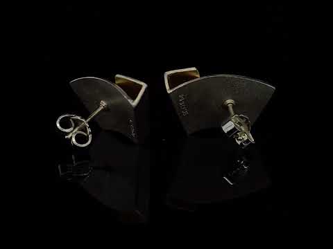 Video of Manu's Contemporary Sterling Silver 22k Yellow Gold Bi Metal Diamond Fold Statement Earrings. Available on DESIGNYARD.com Dublin, Ireland. Free Worldwide Shipping with DHL.