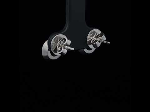 Video of Angela Hubel's Contemporary Platinum Diamond Circle Luxury Statement Earrings. Available on DESIGNYARD.com No 1 for Contemporary Jewellery Dublin, Ireland. Shipping Worldwide.