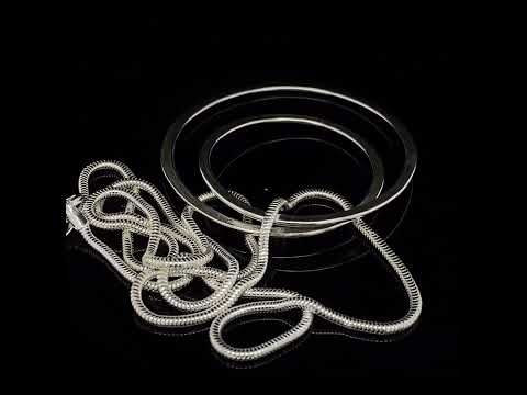 Video of Latham & Neve's Contemporary Sterling Silver Gyra Pendant. Available on DESIGNYARD.com and in our Jewellery Shop Dublin, Ireland. Worldwide Shipping with DHL.