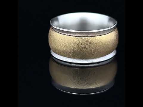 Video of Manu's Contemporary Sterling Silver 22k Yellow Gold Spinning Band Ring. Available on DESIGNYARD.com and in our Jewellery Shop Dublin, Ireland. Free Worldwide Shipping with DHL.