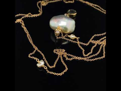 Video of Josephine Bergsøe - 18k 22k Yellow Gold Sapphire Diamond Gone Fishing Pearl Necklace. Available on DESIGNYARD.com and in our Contemporary Jewellery Shop Dublin, Ireland. Free Worldwide Shipping with DHL.