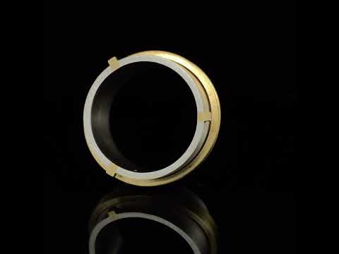 Video of Inga Reed's Contemporary Silver 18k Yellow Gold Rivet Spinner Statement Ring. Available on DESIGNYARD.com and in our Jewellery Shop Dublin, Ireland.