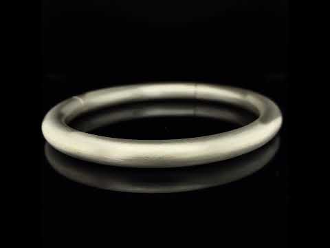 Video of Sarah Herriot's Sterling Silver Round Tension Bangle. Available on DESIGNYARD.com and in our Contemporary Jewellery Shop Dublin, Ireland.