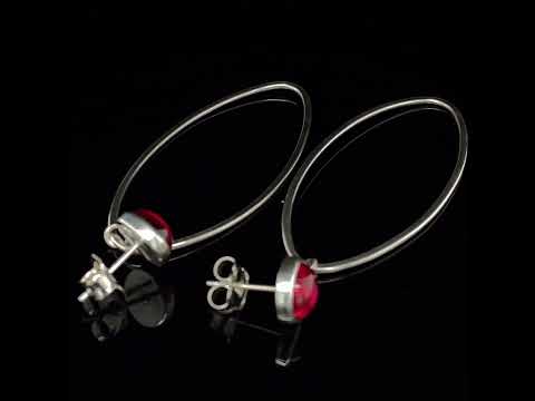 Video of Heather O'Connor's Contemporary Sterling Silver Cascade Ruby Statement Earrings. Available on DESIGNYARD.com and in our Jewellery Shop Dublin, Ireland.