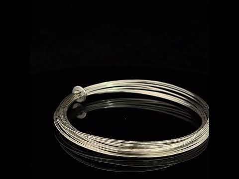 Video of Latham & Neve's Contemporary Sterling Silver Ripple Bangle. Available on DESIGNYARD.com and in our Jewellery Shop Dublin, Ireland. Worldwide Shipping with DHL.