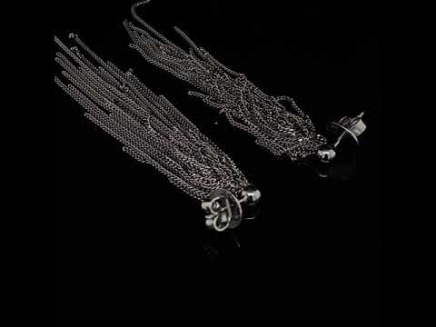 Video of Claudia Milic's Contemporary Sterling Silver Black Feather Drop Earrings. Available on DESIGNYARD.com and in our jewellery shop Dublin, Ireland. Free Worldwide Shipping with DHL.