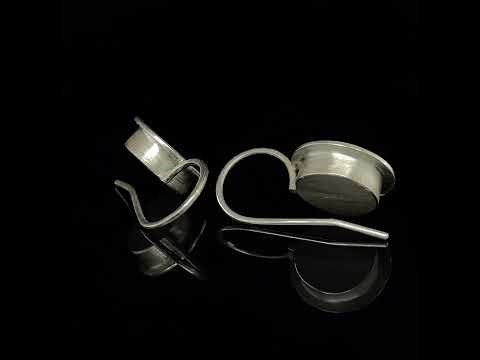 Video of Monika Jakubec's Silver Petrol Blue Resin Drop Statement Earrings. Available on DESIGNYARD.com and in our Contemporary Jewellery Shop Dublin, Ireland. Free Worldwide Shipping with DHL.