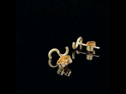 Video of Shimell & Madden's Contemporary 18k Yellow Gold S Stud Dainty Earrings. Available on DESIGNYARD.com and in our Jewellery Shop Dublin, Ireland. Free Worldwide Shipping with DHL.