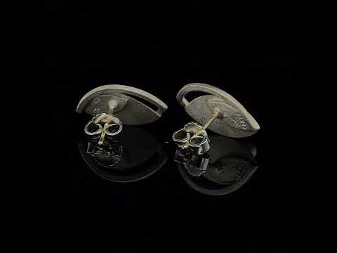 Video of Manu's Contemporary Sterling Silver 22k Yellow Gold Pearl Leaf Statement Earrings. Available on DESIGNYARD.com and in our Jewellery Shop Dublin, Ireland. Free Worldwide Shipping with DHL.