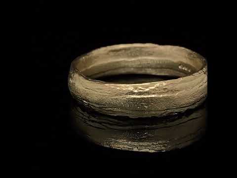 Video of Diana Porter's 9k Fairtrade Yellow Gold Textured Wedding Ring. Available on DESIGNYARD.com and in our Contemporary Jewellery Shop Dublin, Ireland. Free Worldwide Shipping with DHL.