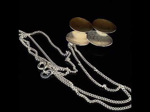 Video of Kokkino's Electra Quad Silver & Yellow Gold Necklace. Available on DESIGNYARD.com and in our Contemporary Jewellery Shop Dublin, Ireland. Free Worldwide Shipping with DHL.