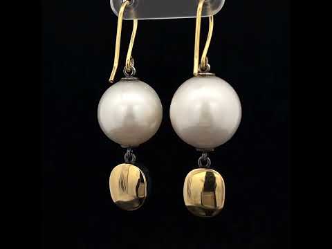 Video of Sam Lafford's 18k Yellow Gold Oxi South Sea Pearl & Spinel Earrings. Available on DESIGNYARD.com and in our Contemporary Jewellery Shop Dublin, Ireland. Free Worldwide Shipping with DHL.