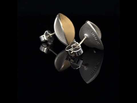 Video of Manu's Contemporary Sterling Silver 22k Yellow Gold Leaf Earrings. Available on DESIGNYARD.com and in our Jewelry Store Dublin, Ireland. Free Worldwide Shipping with DHL.