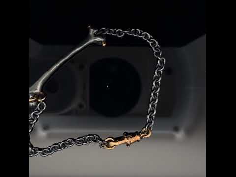 Video of Sam Lafford's Oxidised Silver & 18k Yellow Gold Rodger Bone Bracelet. Available on DESIGNYARD.com and in our Contemporary Jewellery Shop Dublin, Ireland. Free Worldwide Shipping with DHL.