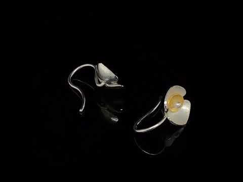 Video of Inga Reed's Contemporary Sterling Silver 22k Yellow Gold Orchid Hook Drop Earrings. Available on DESIGNYARD.com and in our Jewellery Shop Dublin, Ireland.