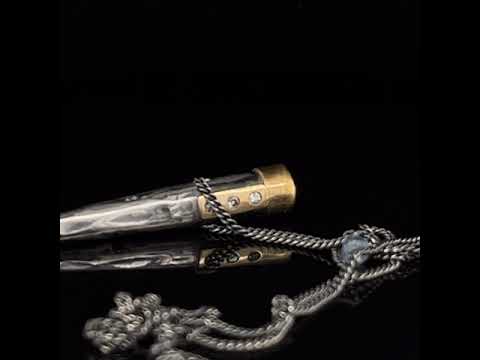 Video of Bergsøe's Handmade Oxidised Silver & 22k Yellow Gold Star Sapphire Diamond Necklace. Available on DESIGNYARD.com and in our Contemporary Jewellery Shop Dublin, Ireland. Free Worldwide Shipping with DHL.