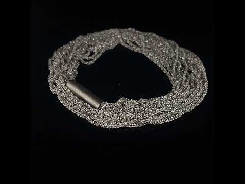 Video of Claudia Milic's Contemporary Designer Sterling Silver Shine Double Bracelet. Available on DESIGNYARD.com and in our Jewellery Shop Dublin, Ireland. Free Worldwide Shipping with DHL.