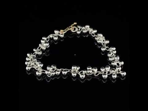 Video of Neeltje Huddleston Slater's Contemporary Fine Silver & 14k Yellow Gold Beaded Bracelet. Available on DESIGNYARD.com and in our Jewellery Shop Dublin, Ireland. Free Worldwide Shipping with DHL.
