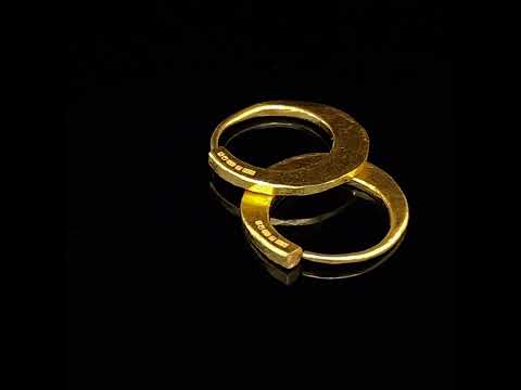 Video of Sarah Herriot's 24k Yellow Gold Hoops 17mm. Available on DESIGNYARD.com and in our Contemporary Jewellery Shop Dublin, Ireland. Free Worldwide Shipping with DHL.