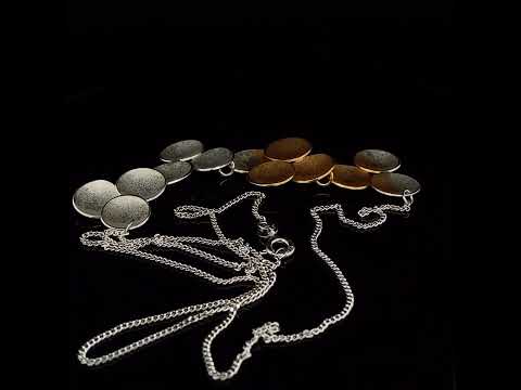 Video of Kokkino's Electra Small Articulated Silver & Yellow Gold Necklace. Available on DESIGNYARD.com and in our Contemporary Jewellery Shop Dublin, Ireland. Free Worldwide Shipping with DHL.