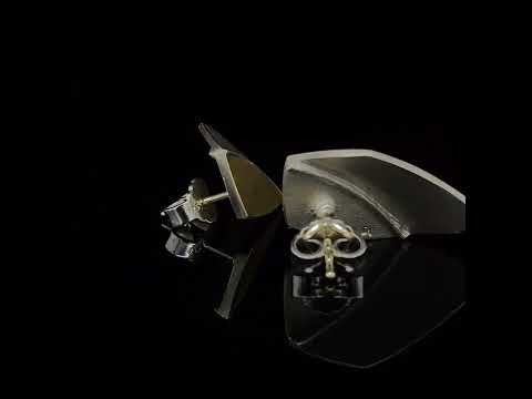 Video of Manu's Contemporary Sterling Silver 22k Yellow Gold Shield Statement Earrings. Available on DESIGNYARD.com and in our Jewellery Shop Dublin, Ireland. Free Worldwide Shipping with DHL.
