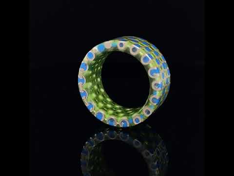 Video of Monika Jakubec's Silver Green Blue Resin Chain Sphere Statement Ring. Available on  DESIGNYARD.com and in our Contemporary Jewellery Shop Dublin, Ireland. Free Worldwide Shipping with DHL.