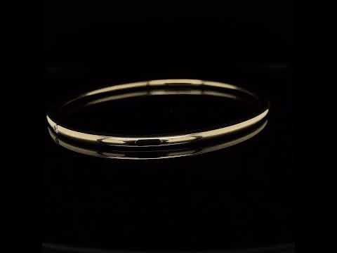 Video of Handmade 9k Yellow Solid Gold Round Nine Diamond Bangle. Available on DESIGNYARD.com and in our Jewelry Store Dublin, Ireland. Free Worldwide Shipping with DHL.