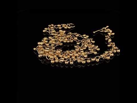 Video of Neeltje Huddleston Slater's Contemporary Fine 14k Yellow Gold Beaded Necklace. Available on DESIGNYARD.com and in our Jewellery Shop Dublin, Ireland. Free Worldwide Shipping with DHL.