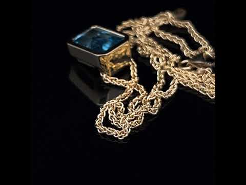 Video of 18k Fair Trade Yellow Gold Tenues Bezəl Aquamarine Pendant. Available on DESIGNYARD.com and in our Jewellery Shop Dublin, Ireland. #1 for Contemporary Jewellery.