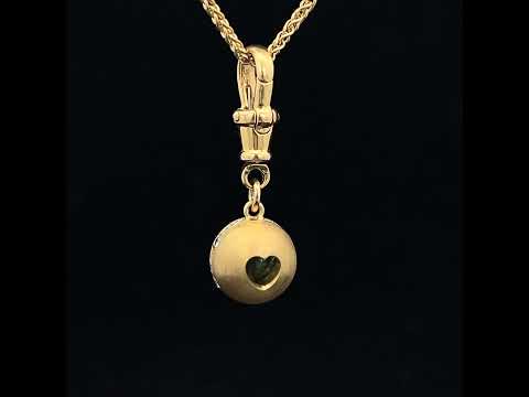 Video of Sam Lafford's 18k Yellow Gold An Grá Demantoid Garnet Diamond Pendant. Available on DESIGNYARD.com and in our Contemporary Jewellery Shop Dublin, Ireland. Free Worldwide Shipping with DHL.
