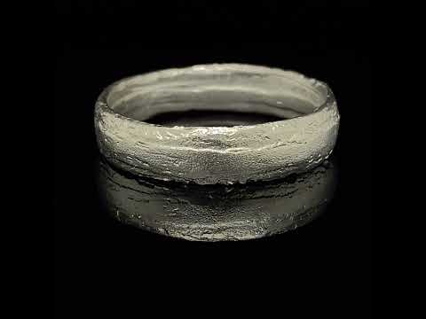 Video of Diana Porter's 9k Fairtrade White Gold Textured Wedding Ring. Available on DESIGNYARD.com  and in our Contemporary Jewellery Shop Dublin, Ireland. Free Worldwide Shipping with DHL.