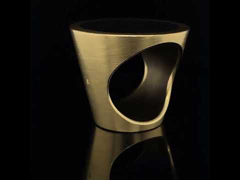Video of Monika Jakubec's 18k Yellow Gold Anthracite Resin Cone Statement Ring. Available on DESIGNYARD.com and in our Contemporary Jewellery Shop Dublin, Ireland. Free Worldwide Shipping with DHL.