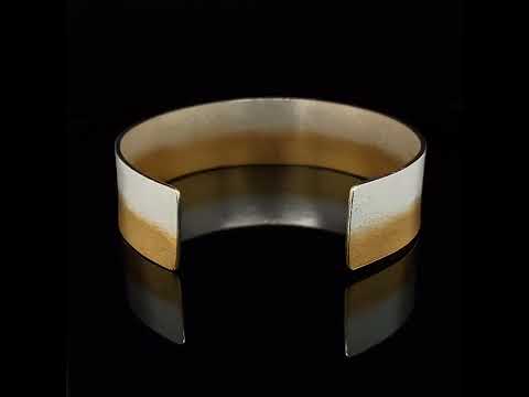 Video of Kokkino's Contemporary Electra Slim Yellow Gold Silver Bracelet. Available on DESIGNYARD.com and in our Jewellery Shop Dublin, Ireland. Free Worldwide Shipping with DHL.