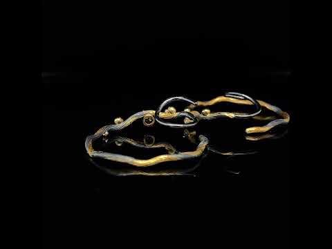 Video of Bergsøe's Silver & Yellow Gold Diamond Hoop Statement Earrings. Available on DESIGNYARD.com and in our Contemporary Jewellery Shop Dublin, Ireland. Free Worldwide Shipping with DHL.