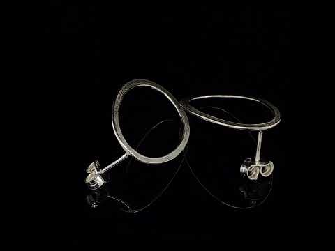 Video of Latham & Neve's Sterling Silver Halo Drop Earrings. Available on DESIGNYARD.com and in our Contemporary Jewellery Shop Dublin, Ireland. Worldwide Shipping with DHL.