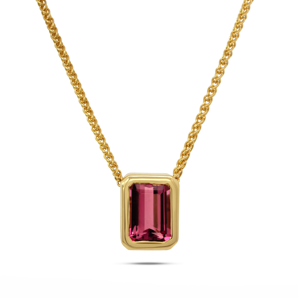 Photograph 2 of Ronan Campbell's Contemporary 18k Fair Trade Yellow Gold Tenues Bezəl Brazilian Tourmaline Pendant. Available on DESIGNYARD.com and in our Jewellery Shop Dublin, Ireland. Free Worldwide Shipping with DHL.