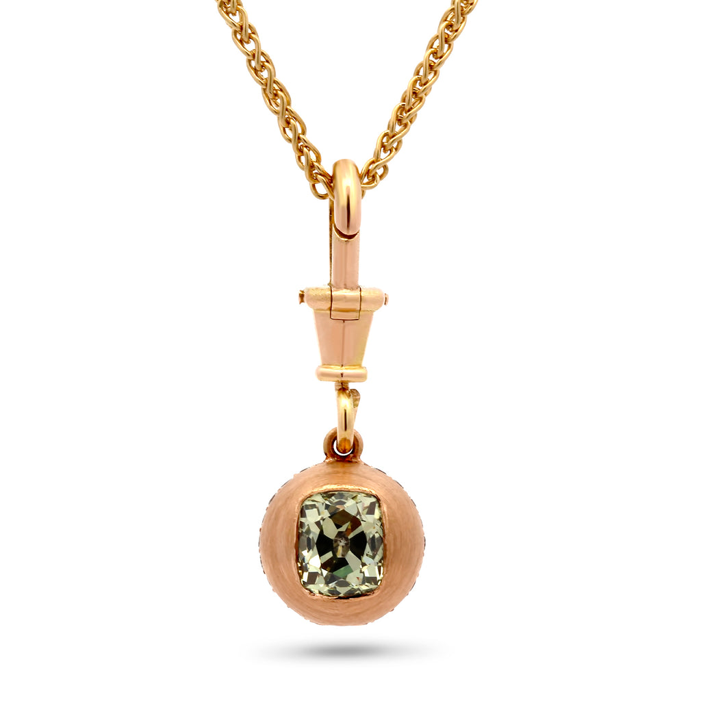 Photograph 1 of Sam Lafford's 18k Yellow Gold An Grá Green Diamond Pendant. Available on DESIGNYARD.com and in our Contemporary Jewellery Shop Dublin, Ireland. Number 1 for Contemporary Jewellery in Dublin.